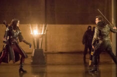 Katrina Law as Nyssa al Ghul and John Barrowman as Malcolm Merlyn in Arrow - 'Sins of the Father'