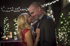 Arrow - Charlotte Ross as Donna Smoak and Paul Blackthorne as Detective Quentin Lance