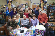 The Big Bang Theory - Seated left to right: Kunal Nayyar, Kaley Cuoco, Adam West, Simon Helberg and Johnny Galecki; standing left to right: Mayim Bialik, Sara Gilbert, Kevin Sussman, Jim Parsons, Melissa Rauch, Wil Wheaton, Christine Baranski, and John Ross Bowie