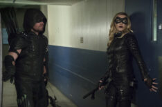 Arrow - Stephen Amell as The Arrow and Katie Cassidy as Laurel Lance/Black Canary