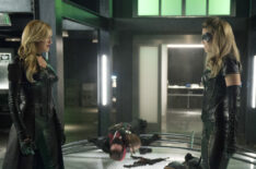 Katie Cassidy as Laurel Lance/Black Siren and Juliana Harkavy as Dinah Drake/Black Canary in Arrow - 'Fallout'