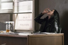 Krysten Ritter drinking in Jessica Jones