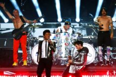 Bruno Mars performs withe the Red Hot Chili Peppers during the Pepsi Super Bowl XLVIII Halftime Show