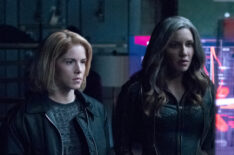 Emily Bett Rickards as Felicity Smoak and Juliana Harkavy as Dinah Drake/Black Canary in Arrow - 'Lost Canary'