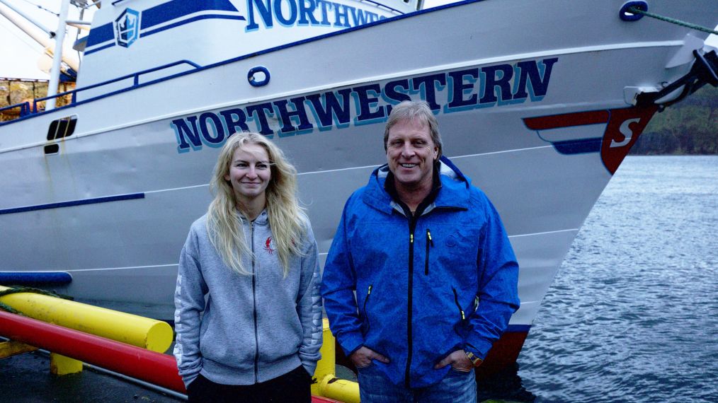 Mandy Hansen and Sig Hansen standing in front of the Northwestern at dock