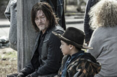 Norman Reedus as Daryl Dixon and Anthony Azor as RJ in The Walking Dead