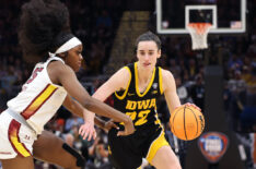 Caitlin Clark #22 of the Iowa Hawkeyes dribbles around Raven Johnson #25 of the South Carolina Gamecocks in the first half during the 2024 NCAA Women's Basketball Tournament National Championship at Rocket Mortgage FieldHouse on April 07, 2024 in Cleveland, Ohio.