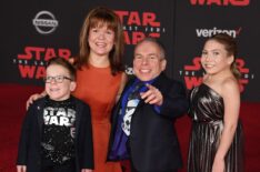 Warwick Davis with his wife Samantha and children