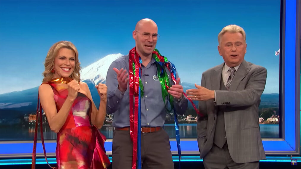 Preston Leslie along with Vanna White and Pat Sajak on Wheel of Fortune