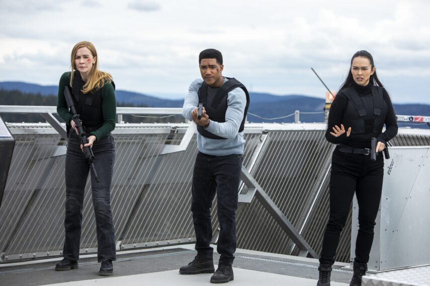 Eva-Jane Willis as Europol Agent Megan “Smitty” Garretson, Carter Redwood as Special Agent Andre Raines, and Vinessa Vidotto as Special Agent Cameron Vo in the 'FBI: International' Season 3 Finale "Tuxhorn"