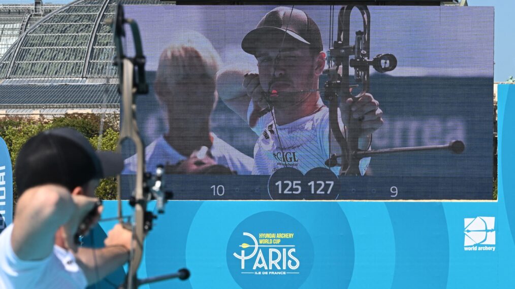 An athlete competes during the World Cup men's archery final at the Esplanade des Invalides as part of the Olympic Games Test Event in Paris, on August 19, 2023. Paris 2024's Olympic Games archery events will take place at the Esplanade des Invalides between July 25 and August 4. (Photo by Stefano RELLANDINI / AFP) (Photo by STEFANO RELLANDINI/AFP via Getty Images)
