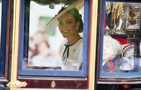 LONDON, ENGLAND - JUNE 15: Catherine, Princess of Wales and Prince Louis of Wales during Trooping the Colour on June 15, 2024 in London, England. Trooping the Colour is a ceremonial parade celebrating the official birthday of the British Monarch. The event features over 1,400 soldiers and officers, accompanied by 200 horses. More than 400 musicians from ten different bands and Corps of Drums march and perform in perfect harmony. (Photo by Neil Mockford/GC Images)