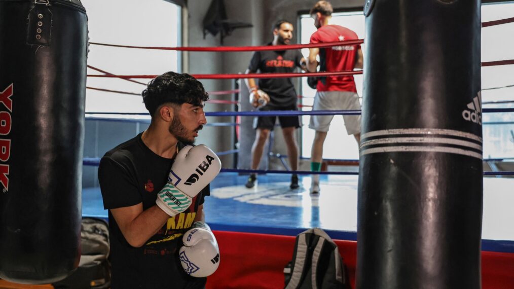 A picture taken on June 22, 2024 shows Palestinian lightweight boxer Waseem Abu Sal training at a gym in Ramallah city in the occupied West Bank, as part of his preparations after qualifying for the upcoming 2024 Paris Olympic games. (Photo by Zain JAAFAR / AFP)