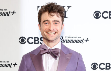 Daniel Radcliffe poses with the Best Performance by an Actor in a Featured Role in a Musical award for 