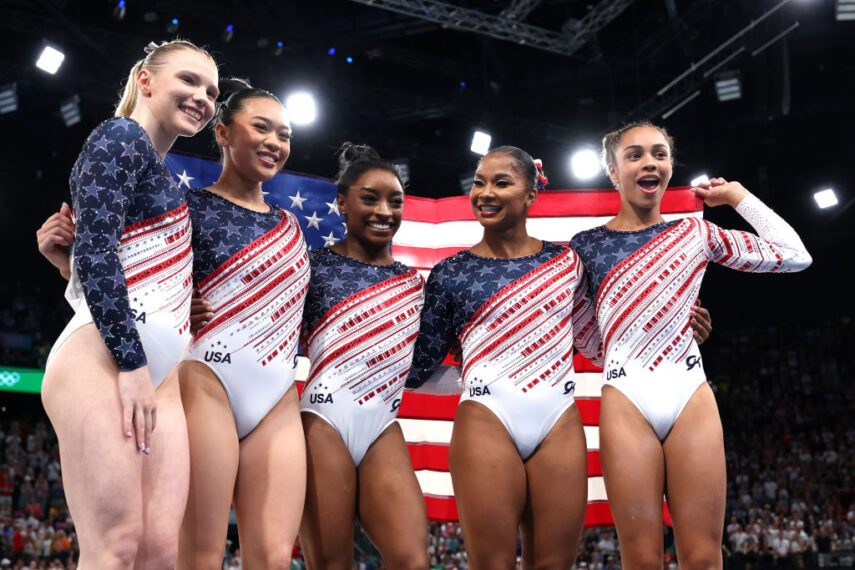 PARIS, FRANCE - JULY 30: (L-R) Jade Carey, Sunisa Lee, Simone Biles, Jordan Chiles and Hezly Rivera of Team United States celebrate during the Artistic Gymnastics Women's Team Final on day four of the Olympic Games Paris 2024 at Bercy Arena on July 30, 2024 in Paris, France. (Photo by Naomi Baker/Getty Images)