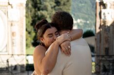 Kalani Hilliker and Nathan Goldman hug each other.