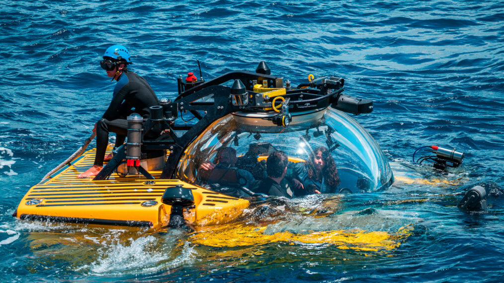 Crew Josh Palmer, Crew Buck Taylor, Eric Stackpole, and Melissa Marquez inside the submarine.