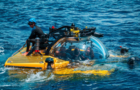 Crew Josh Palmer, Crew Buck Taylor, Eric Stackpole, and Melissa Marquez inside the submarine.