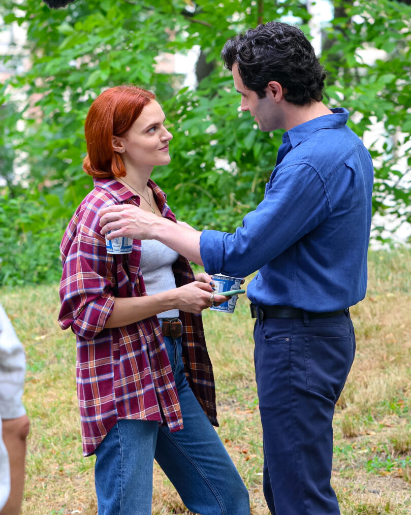 Madeline Brewer and Penn Badgley are seen on the film set of the 'You' in Central Park, Manhattan on July 15, 2024 in New York City.