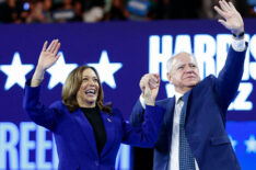 US Vice President and 2024 Democratic presidential candidate Kamala Harris and her running mate Minnesota Governor Tim Walz wave to the crowd after speaking at the campaign rally at the Fiserv Forum in Milwaukee, Wisconsin, August 20, 2024.