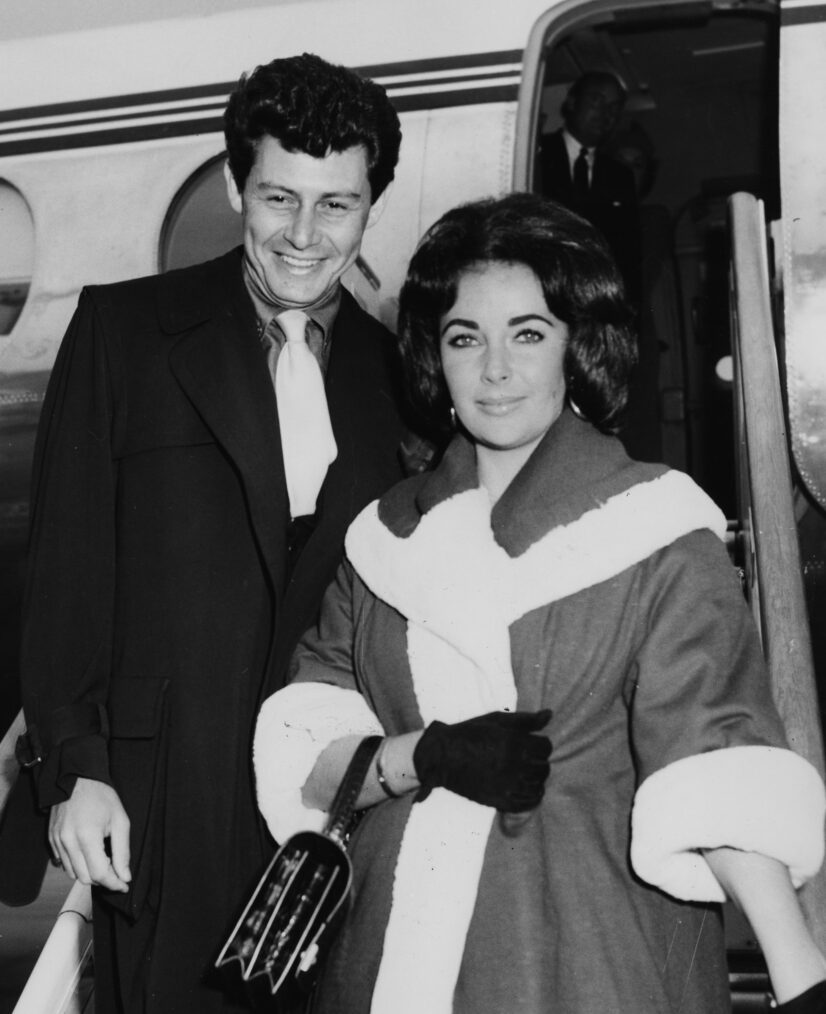 Actress Elizabeth Taylor and her husband, singer Eddie Fisher, leaving their plane after arriving at London Airport, May 26th 1959.