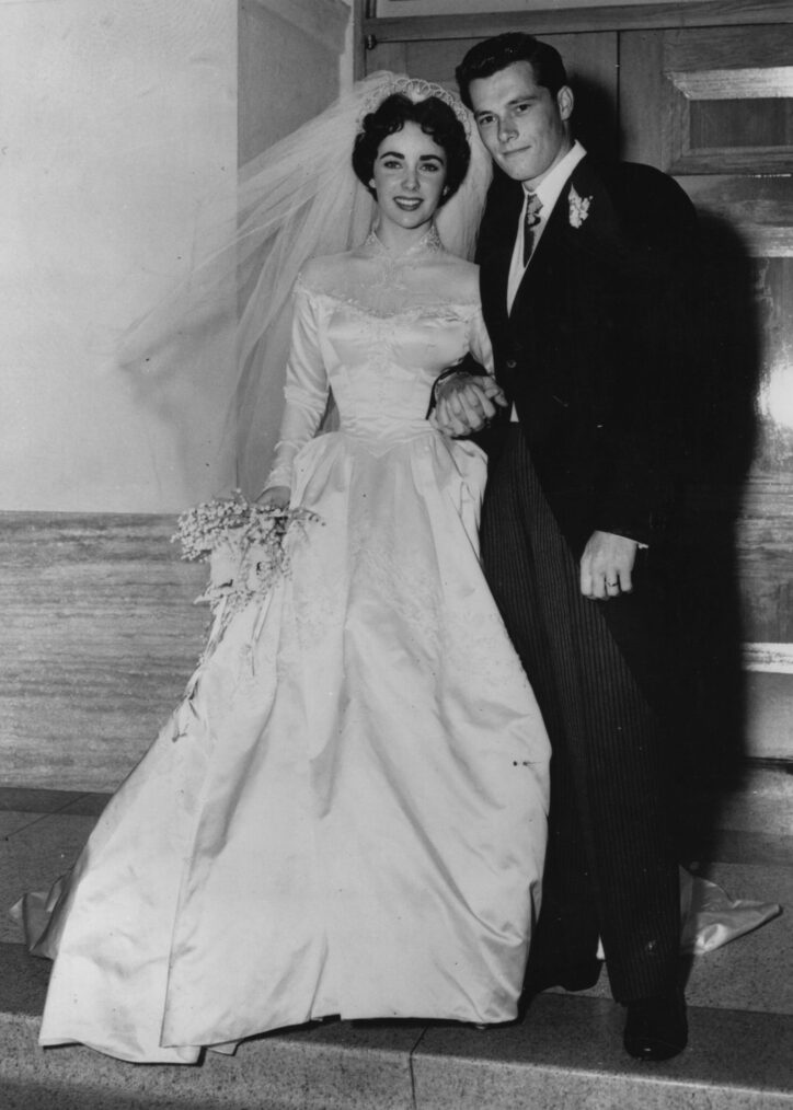 Elizabeth Taylor hotelier Conrad Hilton after their wedding in Hollywood.