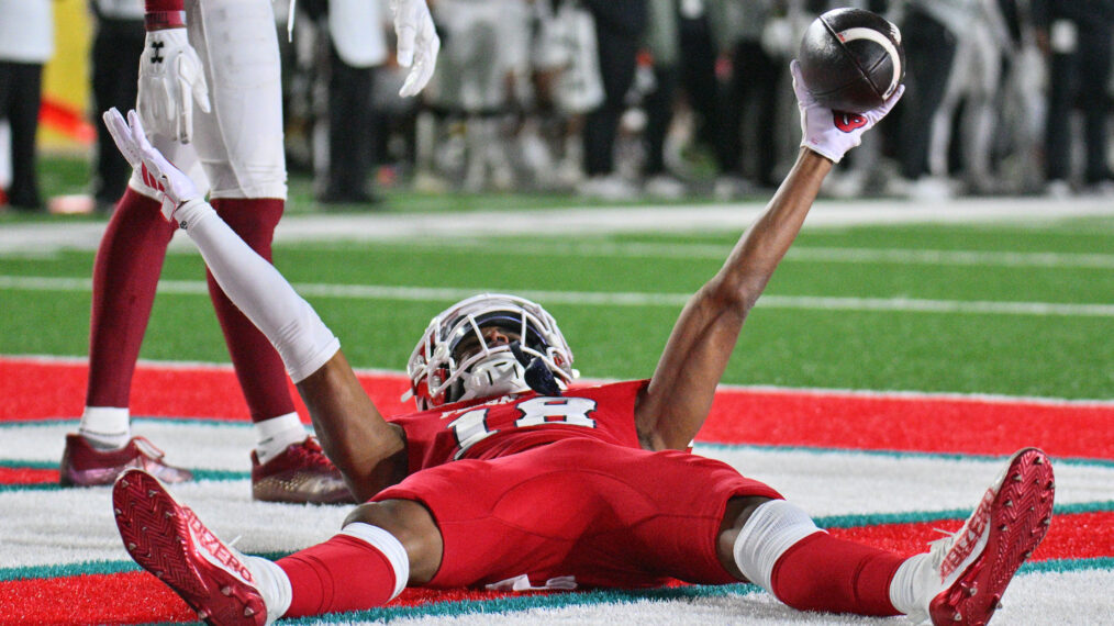 Wide receiver Jalen Moss #18 of the Fresno State Bulldogs celebrates after catching a touchdown pass against the New Mexico State Aggies during the second half of the Isleta New Mexico Bowl at University Stadium on December 16, 2023 in Albuquerque, New Mexico. The Bulldogs defeated the Aggies 37-10.