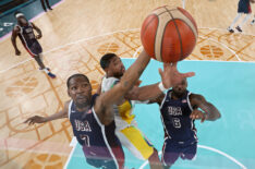 Kevin Durant #7 and Lebron James #6 of Team United States contest for a rebound with Bruno Caboclo #51 of Team Brazil during a Men's basketball quarterfinal game between Team United States and Team Brazil on day eleven of the Olympic Games Paris 2024 at Bercy Arena on August 06, 2024 in Paris, France.