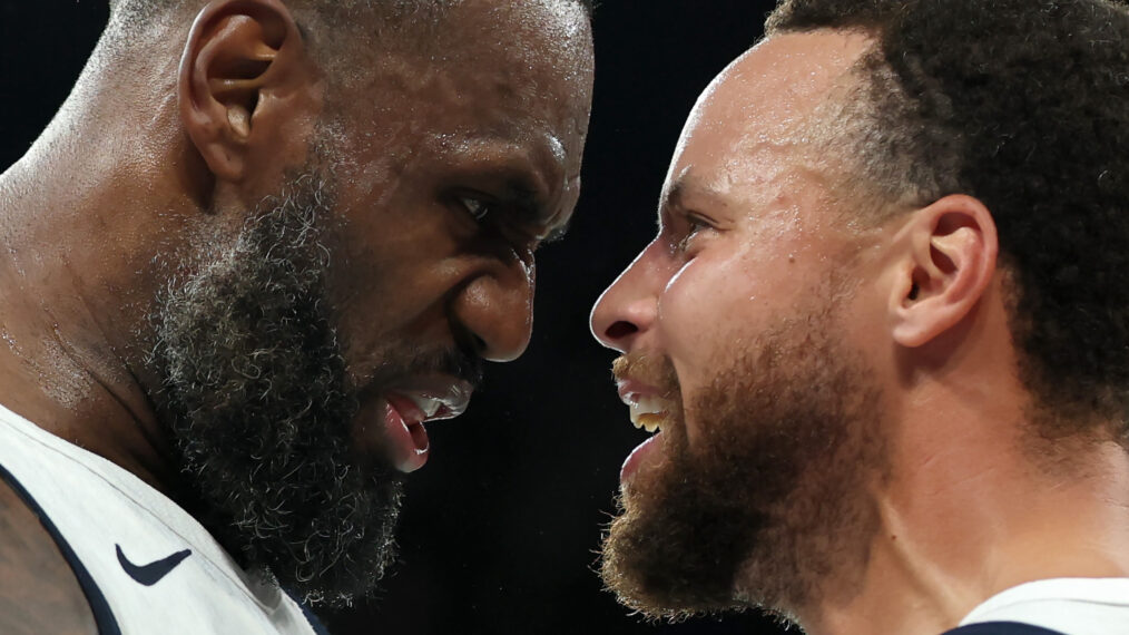 Lebron James #6 and Stephen Curry #4 of Team United States celebrate after their team's win against Team Serbia during a Men's basketball semifinals match between Team United States and Team Serbia on day thirteen of the Olympic Games Paris 2024 at Bercy Arena on August 08, 2024 in Paris, France.