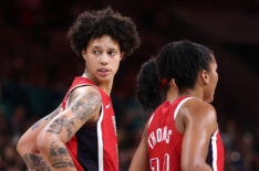 Brittney Griner #15 and Alyssa Thomas #14 of Team United States look on during a Women's basketball Group Phase - Group C game between the United States and Germany on day nine of the Olympic Games Paris 2024 at Stade Pierre Mauroy on August 04, 2024 in Lille, France.