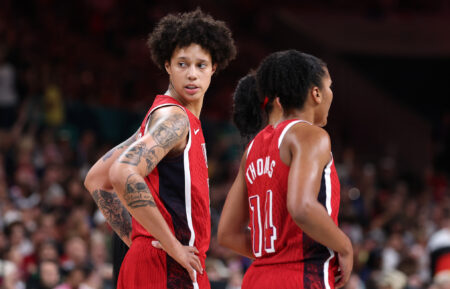 Brittney Griner #15 and Alyssa Thomas #14 of Team United States look on during a Women's basketball Group Phase - Group C game between the United States and Germany on day nine of the Olympic Games Paris 2024 at Stade Pierre Mauroy on August 04, 2024 in Lille, France.