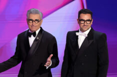 Hosts Eugene Levy and Dan Levy speak onstage during the 76th Primetime Emmy Awards at Peacock Theater on September 15, 2024 in Los Angeles, California.