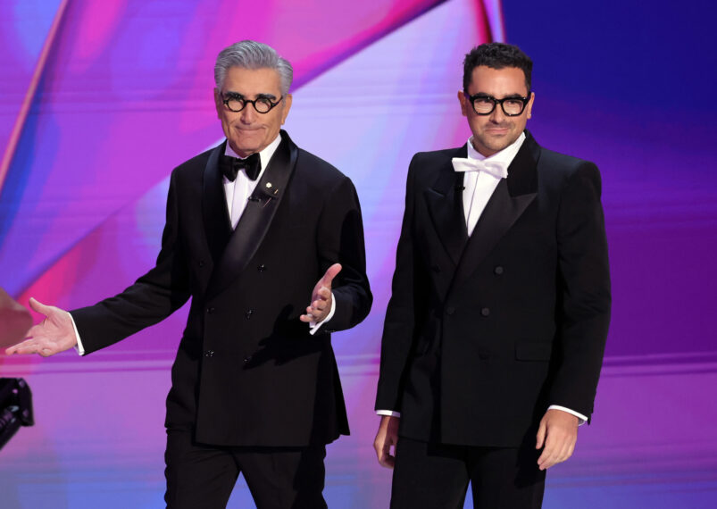 Hosts Eugene Levy and Dan Levy speak onstage during the 76th Primetime Emmy Awards at Peacock Theater on September 15, 2024 in Los Angeles, California.