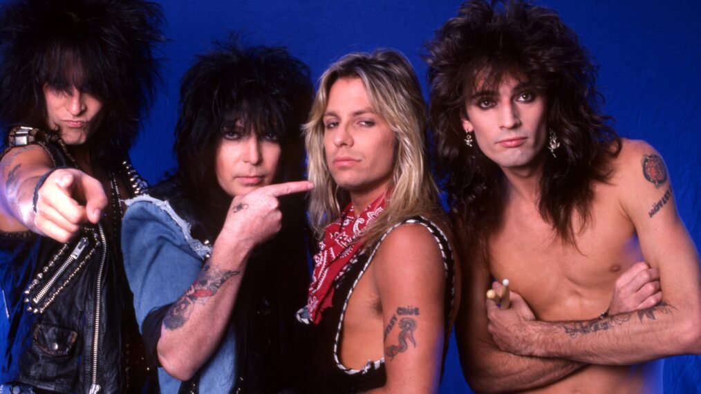 Bassist Nikki Sixx, lead guitarist Mick Mars, lead singer Vince Neil, and drummer Tommy Lee of the American hard rock band Motley Crue pose for a portrait for a portrait backstage at the Joe Louis Arena during the 