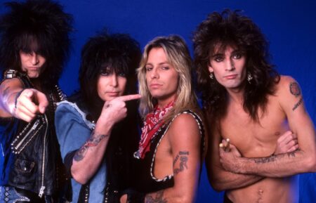 Bassist Nikki Sixx, lead guitarist Mick Mars, lead singer Vince Neil, and drummer Tommy Lee of the American hard rock band Motley Crue pose for a portrait for a portrait backstage at the Joe Louis Arena during the 