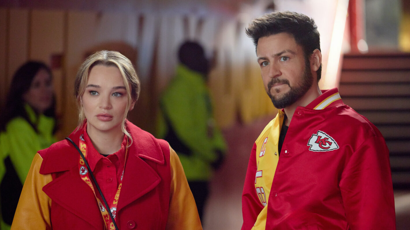 Tyler Hynes and Hunter King in 'Holiday Touchdown: A Chiefs Love Story'