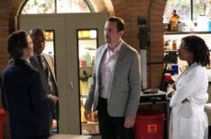 Rocky Carroll as NCIS Director Leon Vance, Sean Murray as Special Agent Timothy McGee, and Diona Reasonover as Forensic Scientist Kasie Hines in the 'NCIS' Season 22 premiere 'Empty Nest'