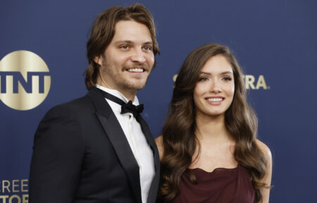 Luke Grimes and Bianca Rodrigues attend the 28th Annual Screen Actors Guild Awards at Barker Hangar on February 27, 2022 in Santa Monica, California.