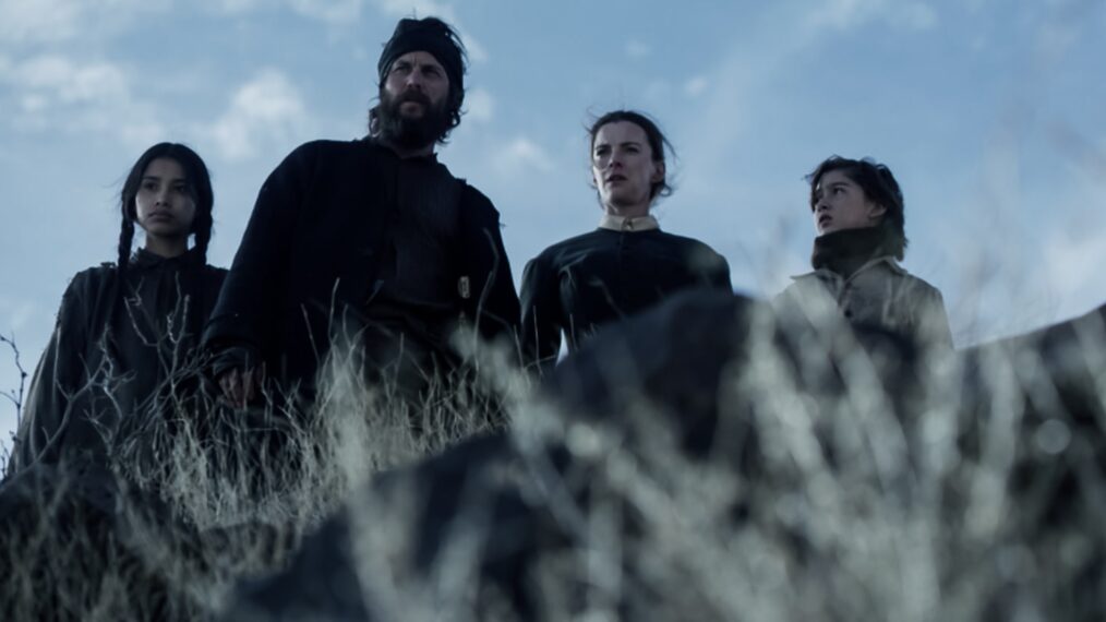 Shawnee Pourier as Two Moons, Taylor Kitsch as Isaac, Betty Gilpin as Sara Rowell, and Preston Mota as Devin Rowell — 'American Primeval'