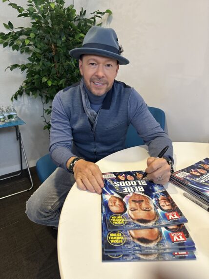 Donnie Wahlberg signs copies of TV Guide Magazine's 'Blue Bloods: The Special Farewell Edition' issue at the TV Insider office