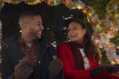 Devale Ellis as Teddy and Christina Milian as Layla in Meet Me Next Christmas