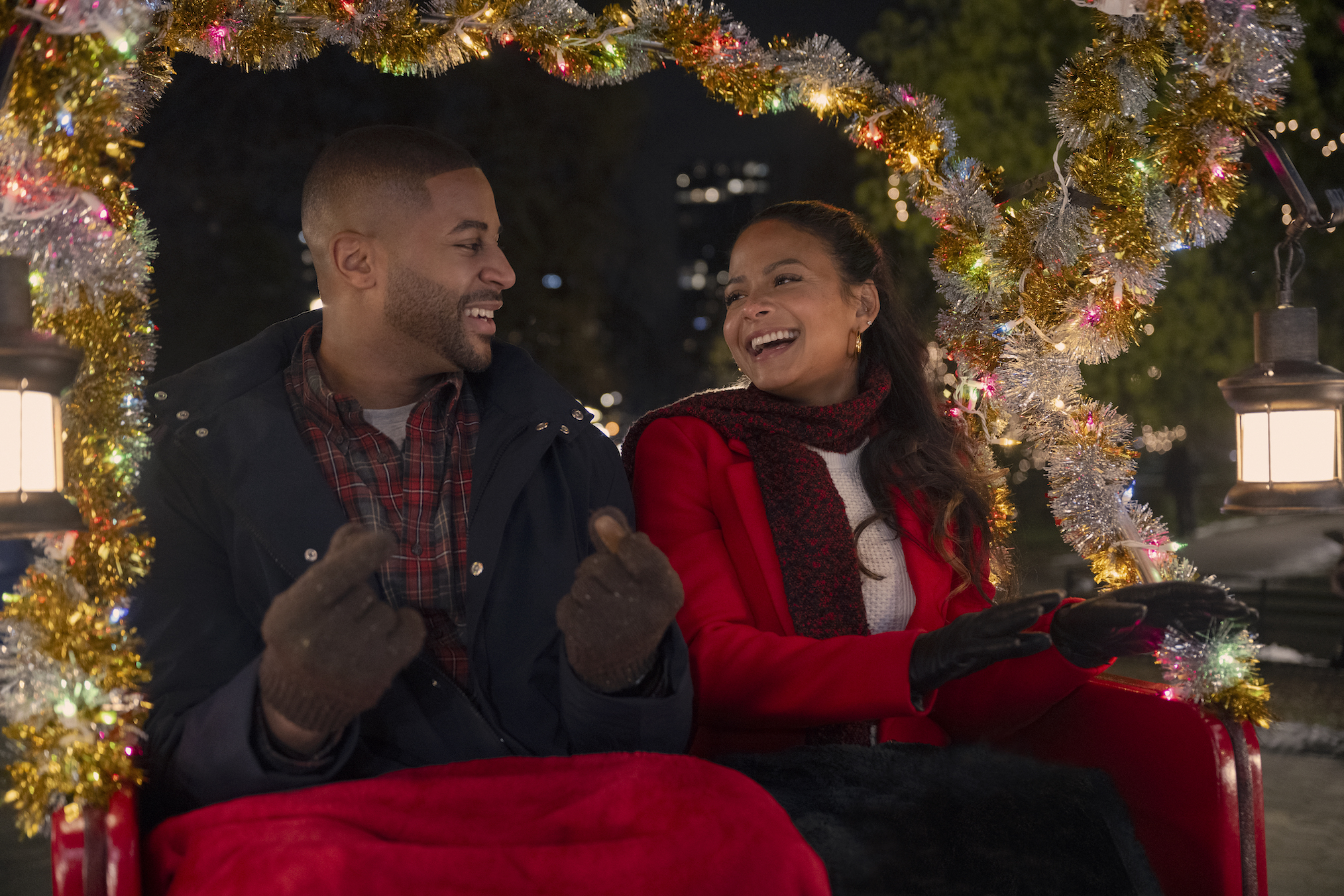 Meet Me Next Christmas. (L to R) Devale Ellis as Teddy and Christina Milian as Layla in Meet Me Next Christmas.