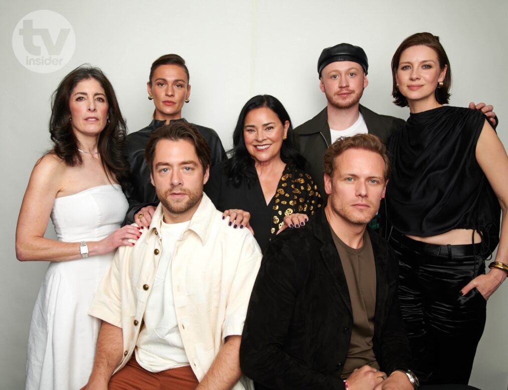 (L-R) 'Outlander's Maril Davis, Richard Rankin, Sophie Skelton, Diana Gabaldon, Sam Heughan, John Bell, and Caitríona Balfe in TV Insider's NYCC 2024 portrait studio