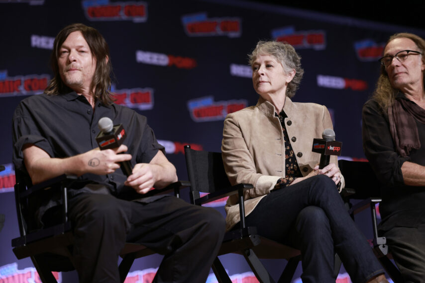 Norman Reedus and Melissa McBride speak onstage at The Walking Dead Universe during New York Comic Con 2024 at The Jacob K. Javits Convention Center on October 18, 2024 in New York City.