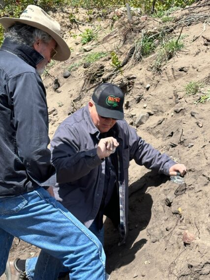 Duane Ollinger watches as Bob Morton collects samples at the Bead Site.