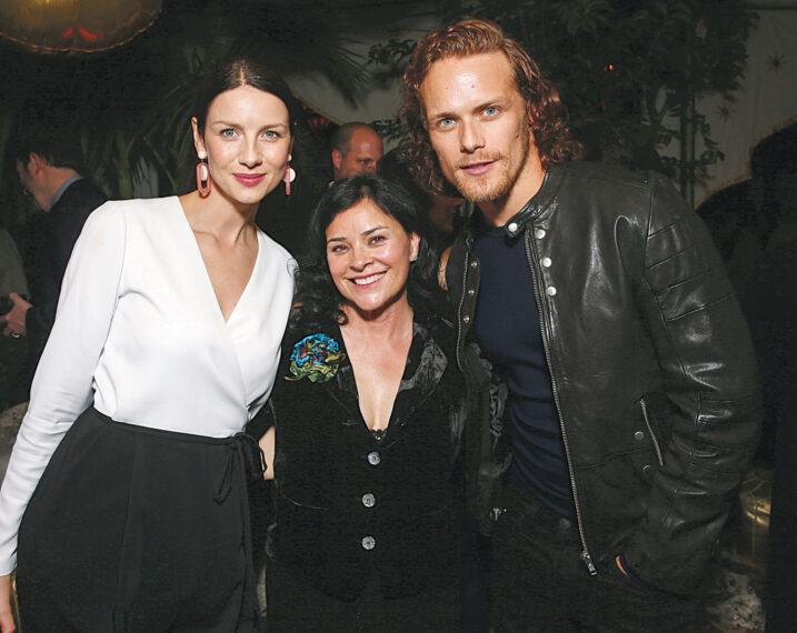 Diana Gabaldon with Balfe and Heughan in her Season 1 Cameo Role