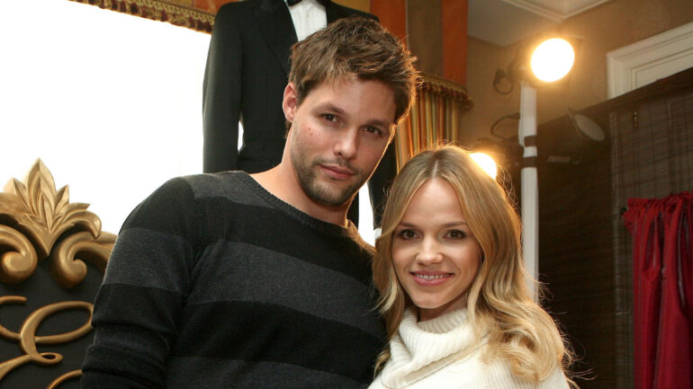 Alexa Havins and Justin Bruening poses with the XXX display during the HBO Luxury Lounge in honor of the 66th Annual Golden Globes held at the Four Seasons Hotel on January 10, 2009 in Beverly Hills, California.