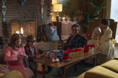 Aice Brown as Angela Turner, Edward Shaw as Teddy Turner, Stephen McGann as Dr. Patrick Turner, and April Rae Hoang as May Tang in the 2024 'Call the Midwife' Holiday Special