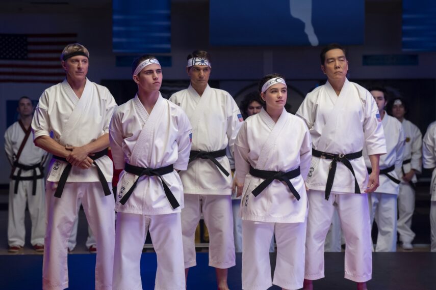 Cobra Kai. (L to R) William Zabka as Johnny Lawrence, Tanner Buchanan as Robby Keene, Ralph Macchio as Daniel LaRusso, Mary Mouser as Samantha LaRusso, Yuji Okumoto as Chozen in Cobra Kai. Cr. Curtis Bonds Baker/Netflix © 2024