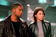 Will Smith as Del Spooner and Bridget Moynahan as Susan Calvin in 'I, Robot'